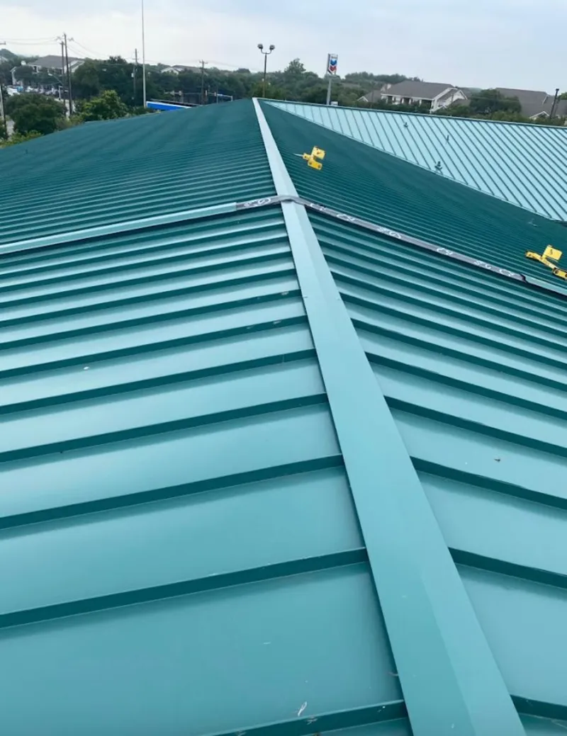 Green commercial metal roof ridge and valley for Metal Roof Repair in Brooklyn Park